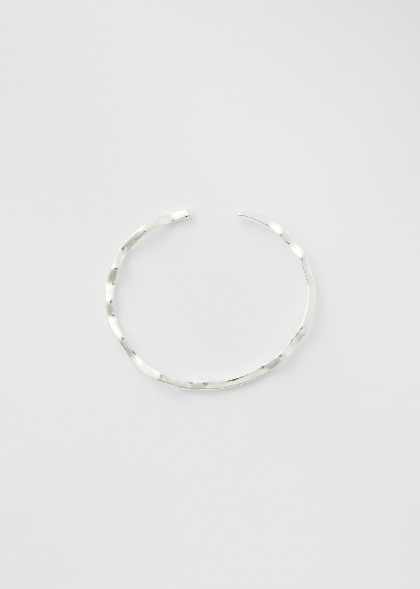 Uneaven Silver Bangle