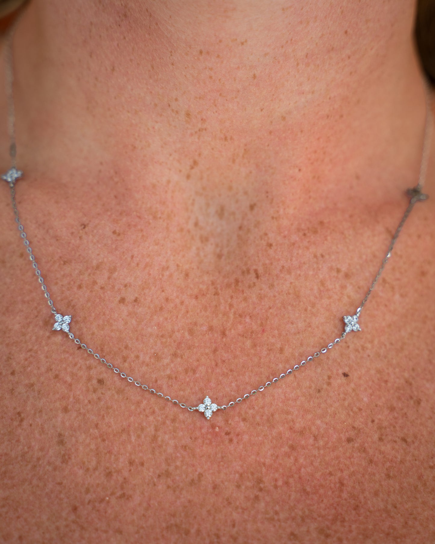 Quarterfoil Star Necklace Gold