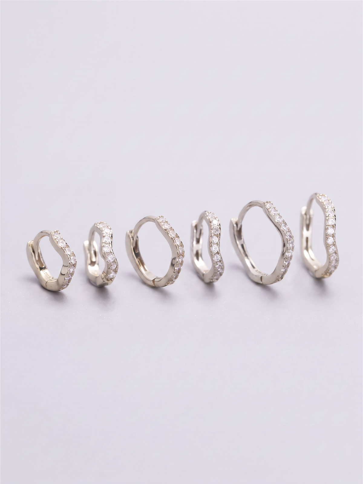 Wavy Zirconia Huggies Silver